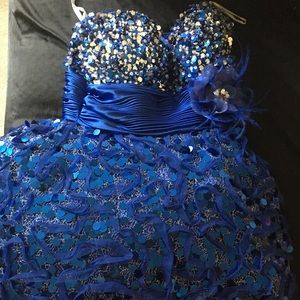 Blue,short, sparkles, and strapless prom dress.